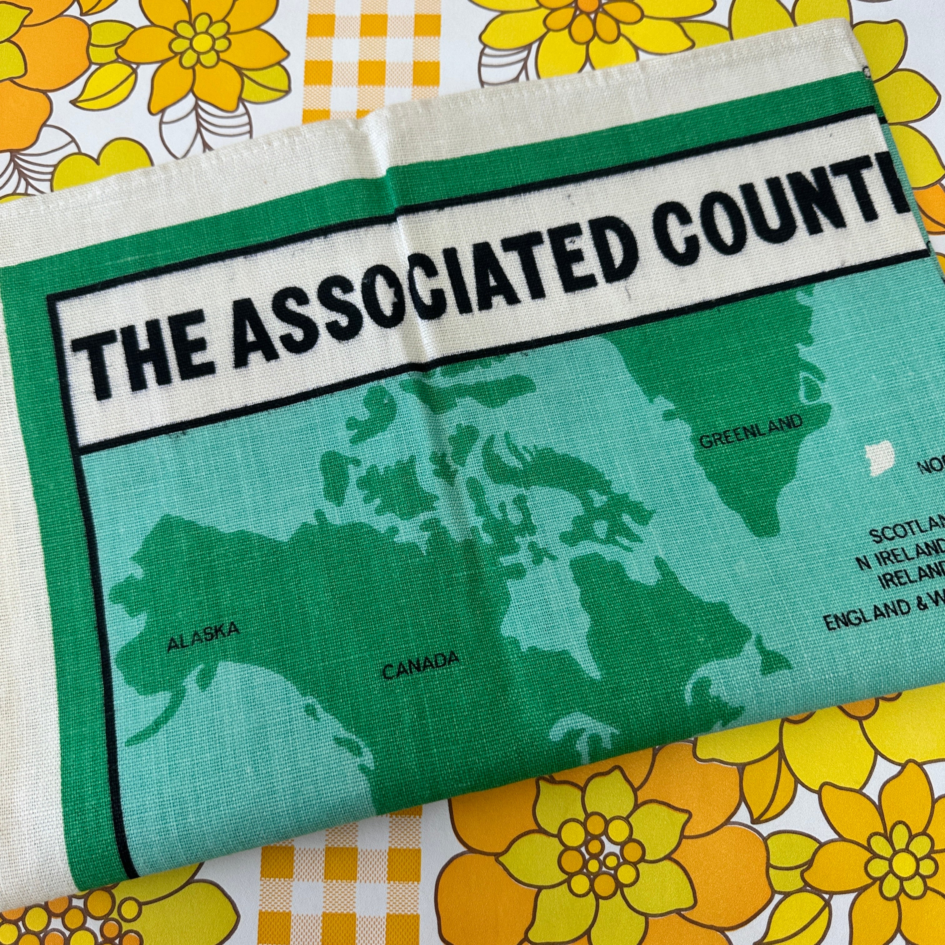 The Associated Country Women of the World Tea Towel